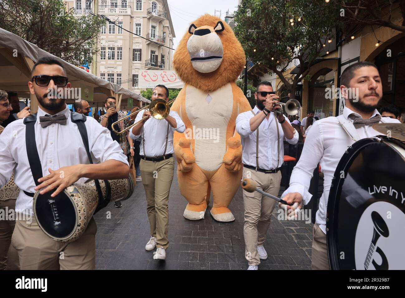 Beirut, Lebanon. 21st May, 2023. A band parades at a street fair in