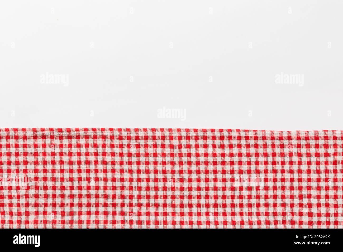 top view with red empty kitchen napkin isolated on table background