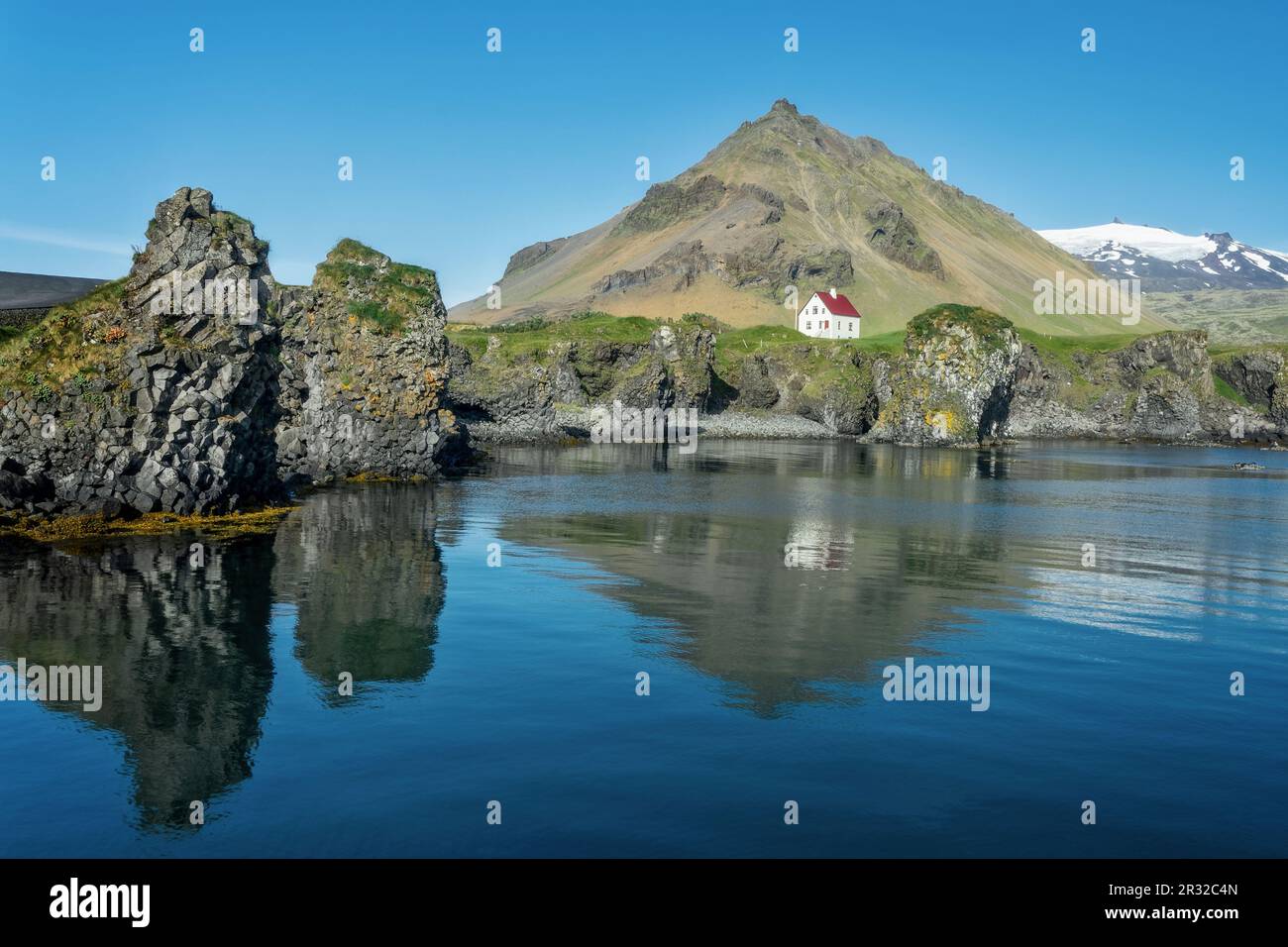 Little white house in Arnarstapi, Snaefellsnes peninsula scenic landscape, Iceland Stock Photo