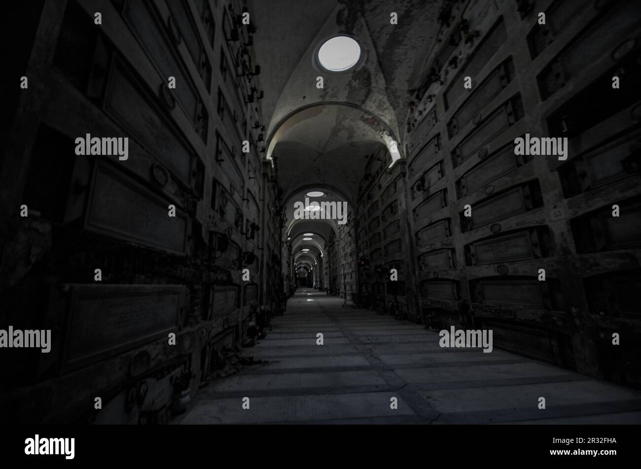 Long corridor with rows of graves a deep deafening silence that ...
