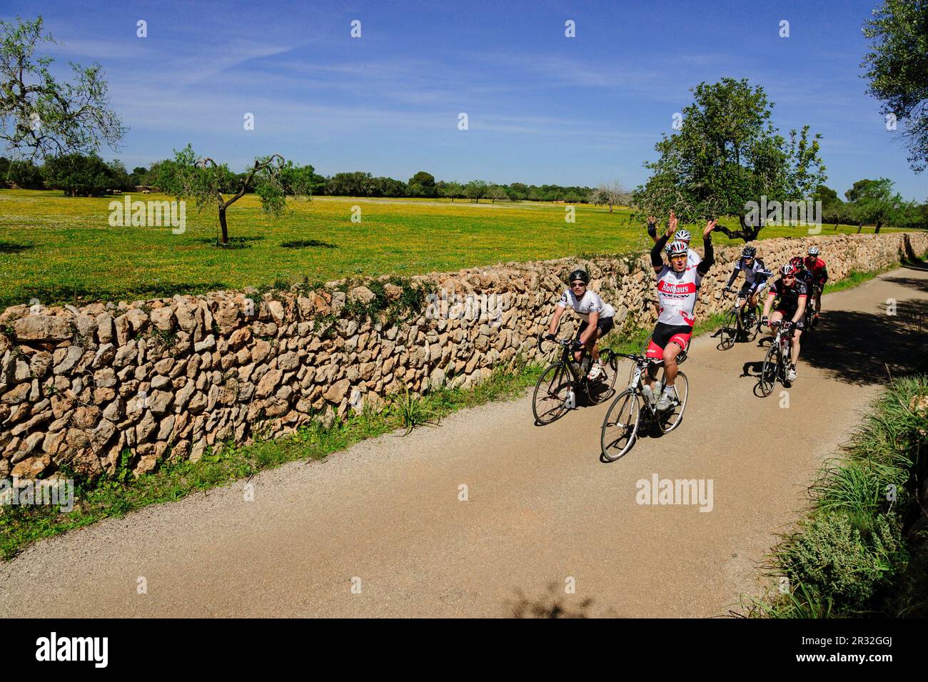 ciclistas een el camino de Cala Pí, llucmajor, mallorca, islas baleares, españa, europa. Stock Photo