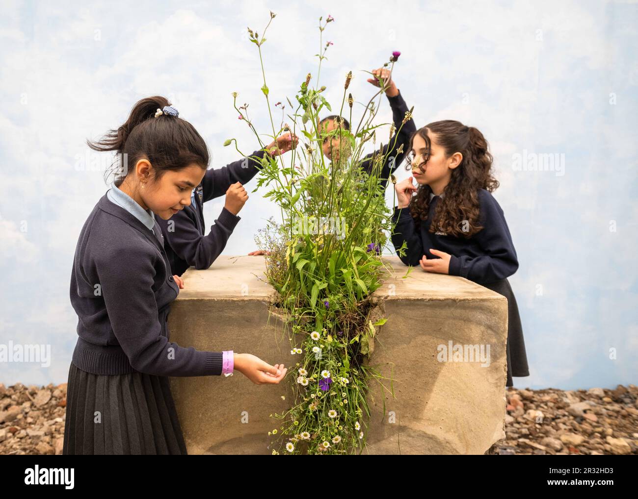 EDITORIAL USE ONLY Students from Alec Reed Academy in Northolt view the