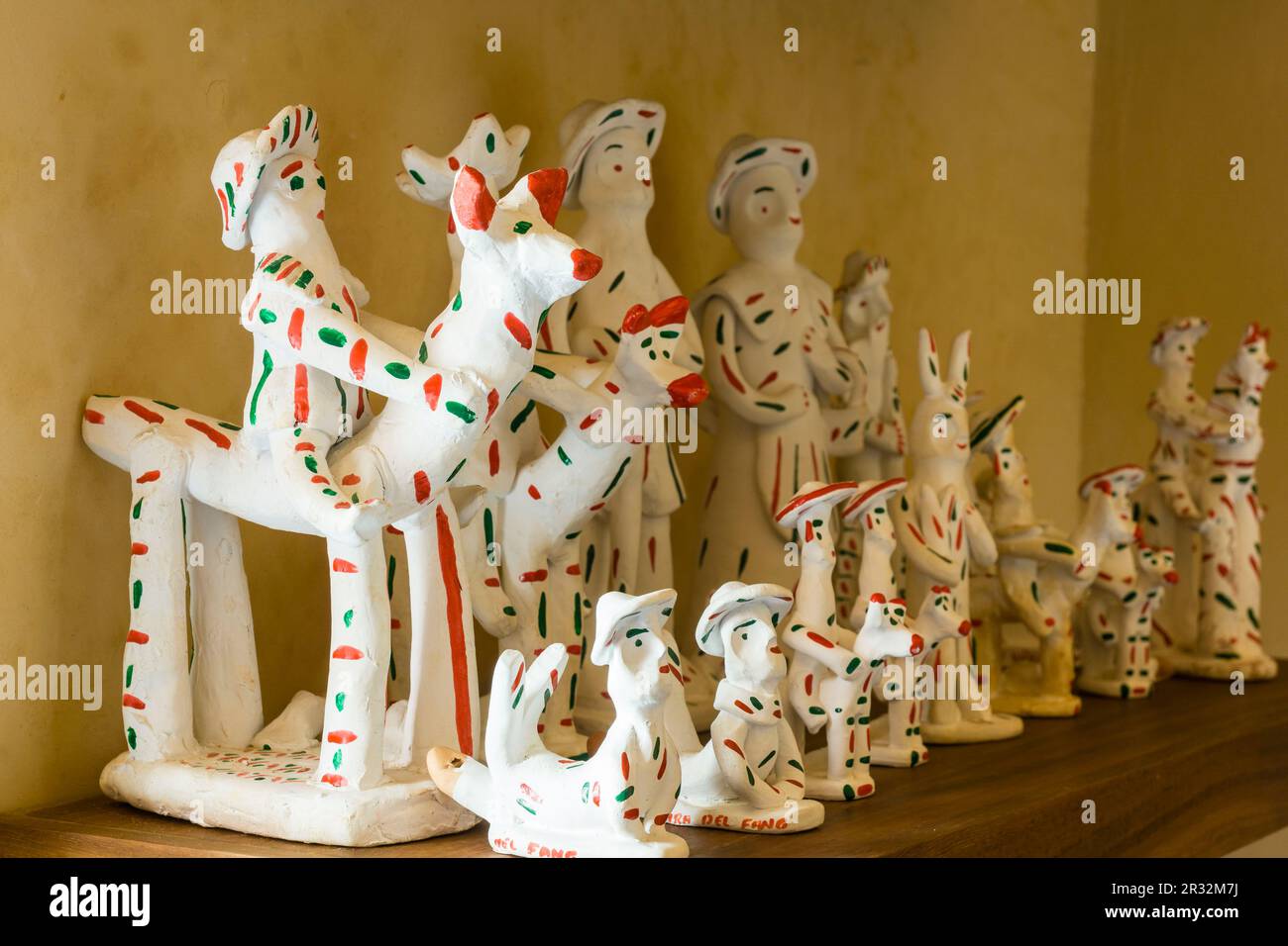 Siurells,figurita tradicional,pintada de blanco y con motas de color rojo y verde, Museu del Fang ( museo del fango) Sa Cabaneta, Marratxí, Mallorca, islas baleares,Spain. Stock Photo