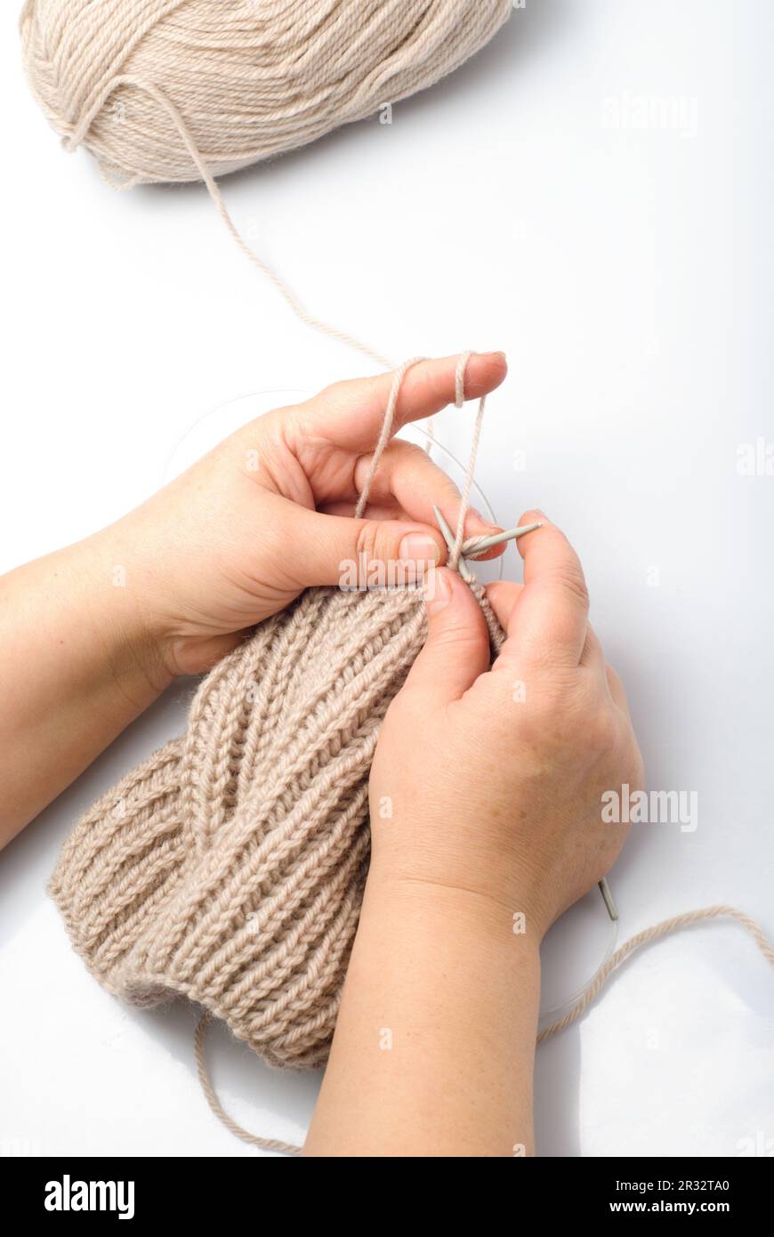Knitting hands Stock Photo
