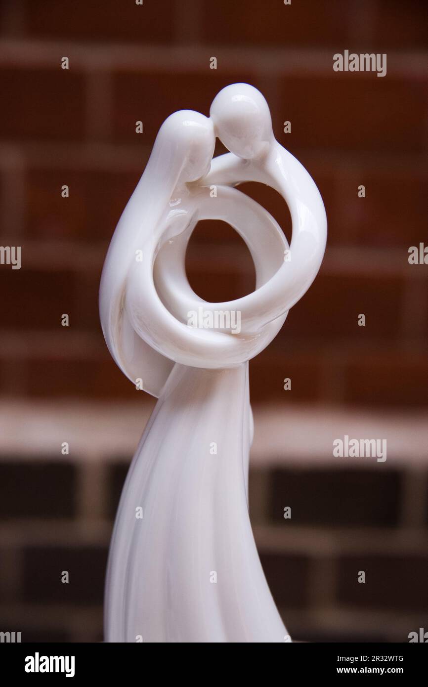 Figurine embrace hi-res stock photography and images - Alamy