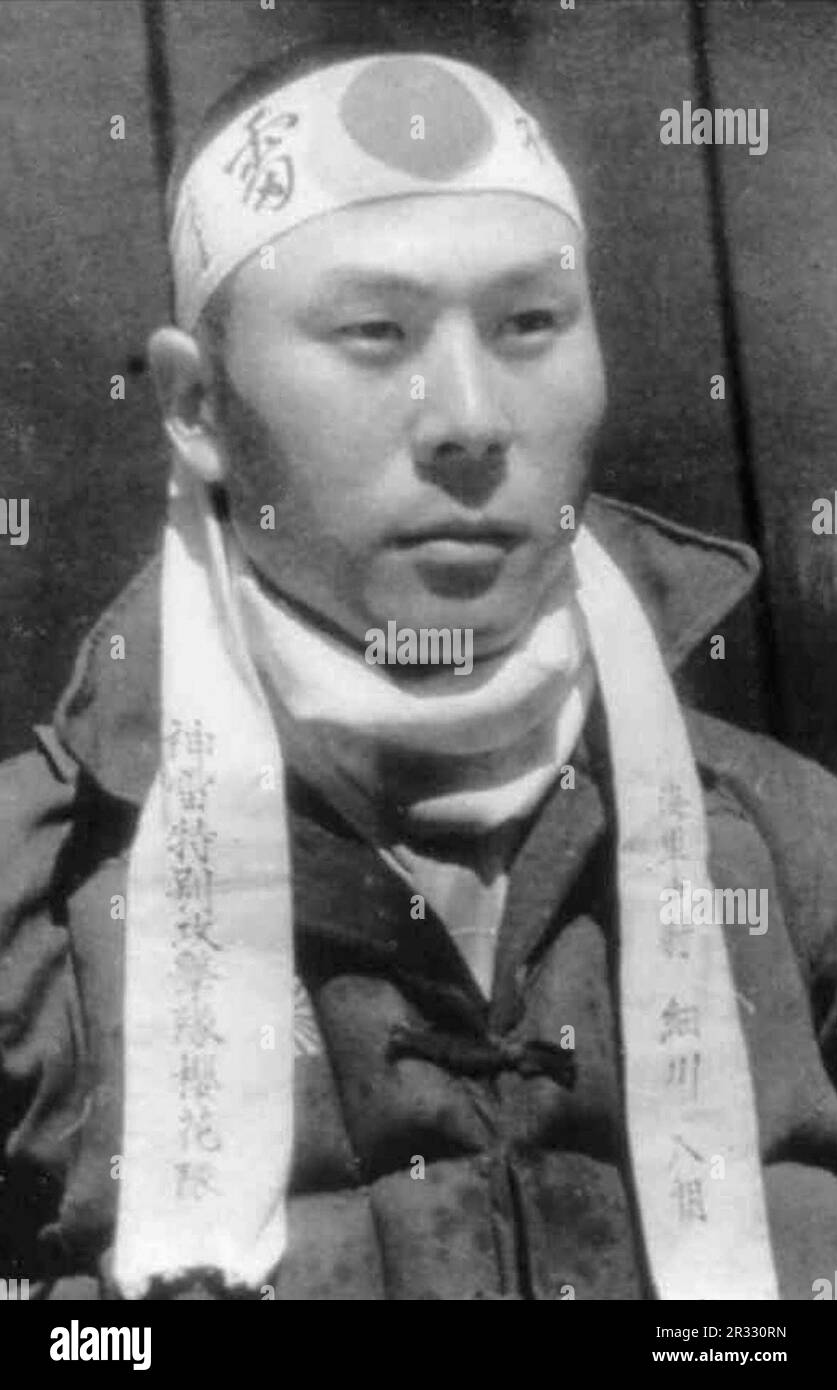 IJN lieutenant junior grade Hachiro Hosokawa wearing the white headband ...