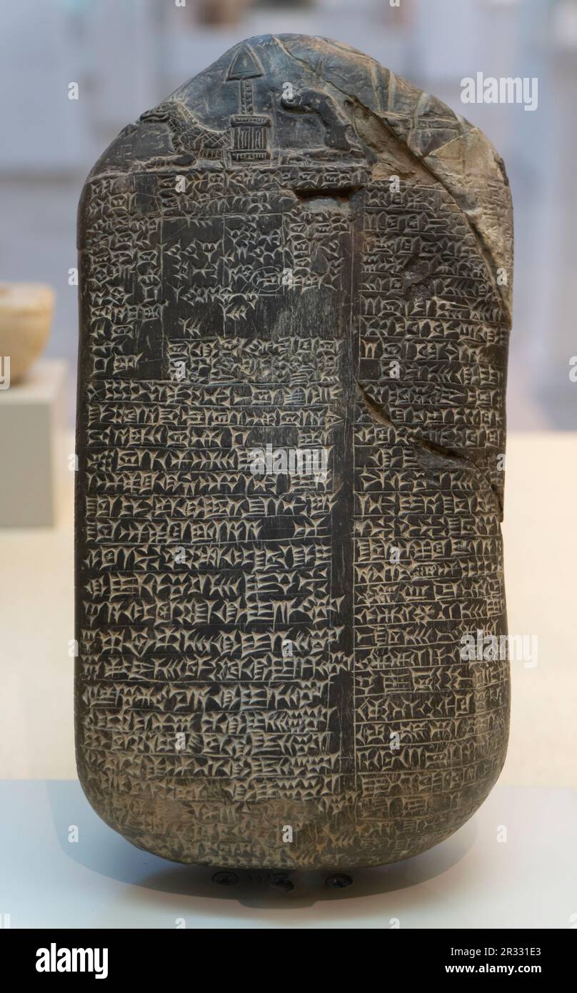 Stone stele from 960 BCE Mesopotamia known as kudurru with a cuneiform inscription in Akkadian language displayed in the archeological 'Bible Lands Museum' in Givat Ram West Jerusalem Israel Stock Photo