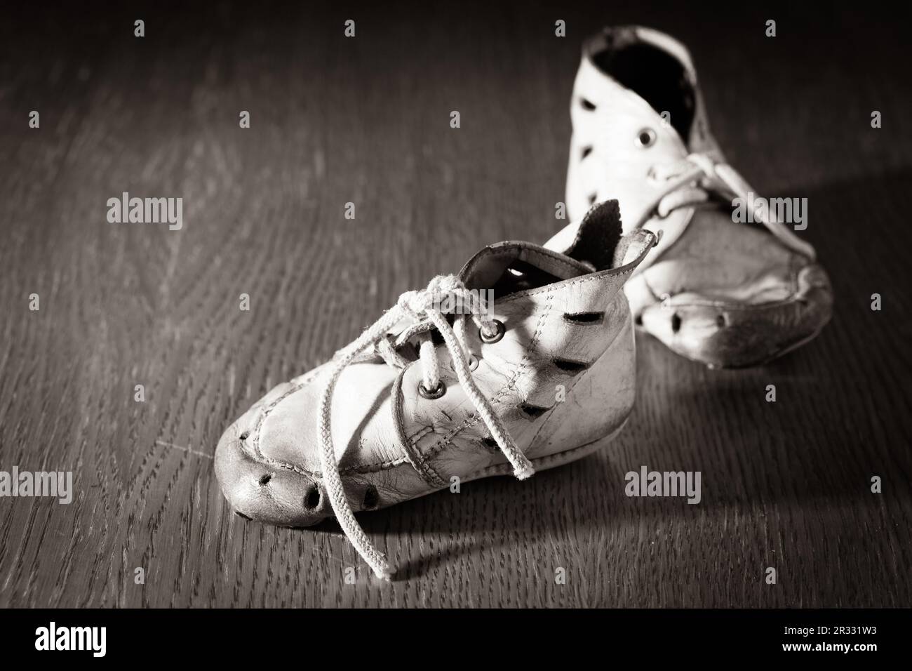 Old baby shoes Stock Photo - Alamy