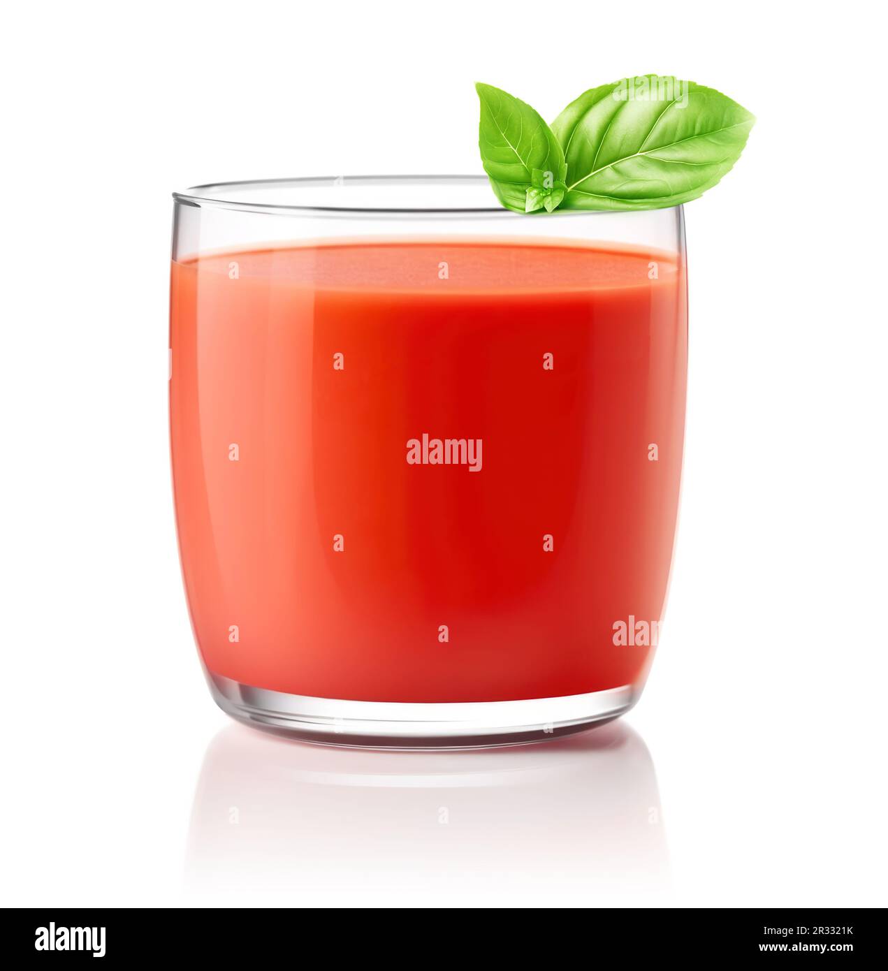 Tomato juice in glass with basil leaf, isolated on white background Stock Photo
