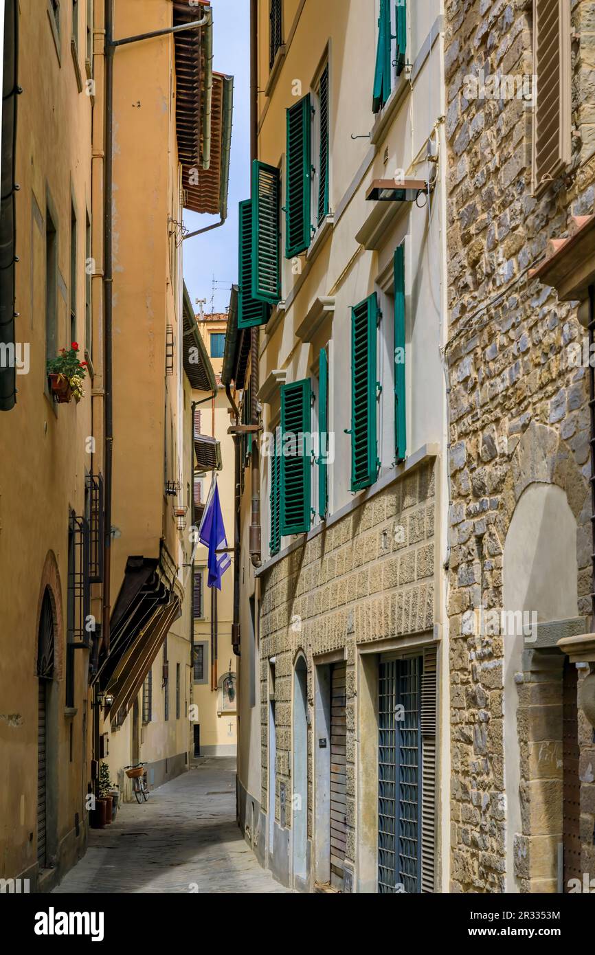 Medieval Renaissance gothic buildings along a narrow street in Oltrarno Santo Spirito area of Centro Storico or Historic Centre of Florence, Italy Stock Photo