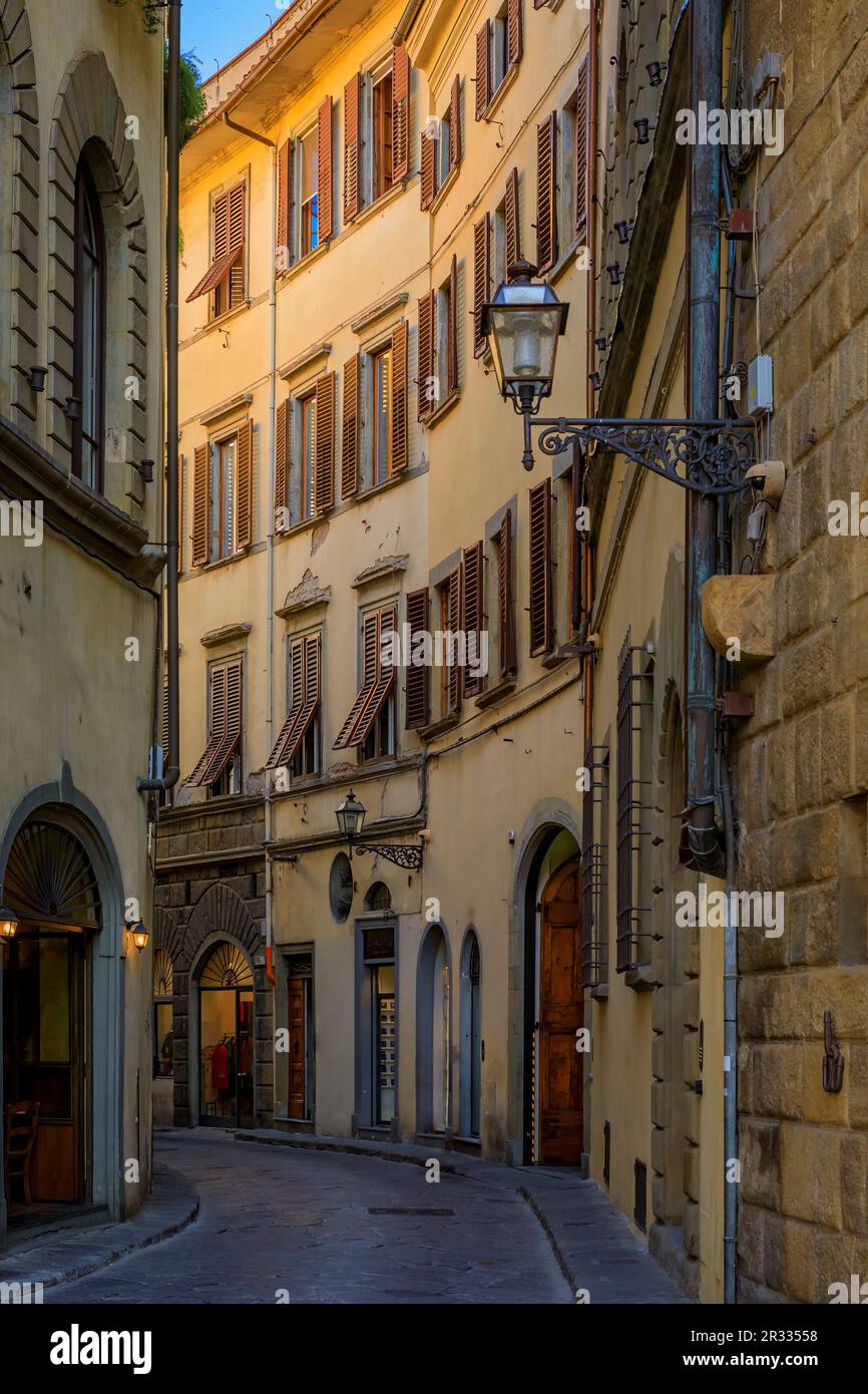 Medieval Renaissance gothic buildings along a narrow street in Centro Storico or Historic Centre of Florence, Italy Stock Photo