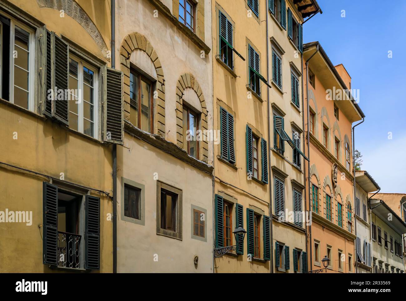 Medieval Renaissance gothic buildings along a narrow street in Oltrarno Santo Spirito area of Centro Storico or Historic Centre of Florence, Italy Stock Photo