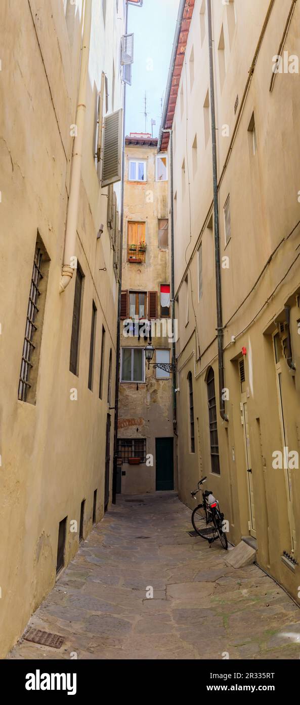 Medieval Renaissance gothic buildings along a narrow street in Centro Storico or Historic Centre of Florence, Italy Stock Photo