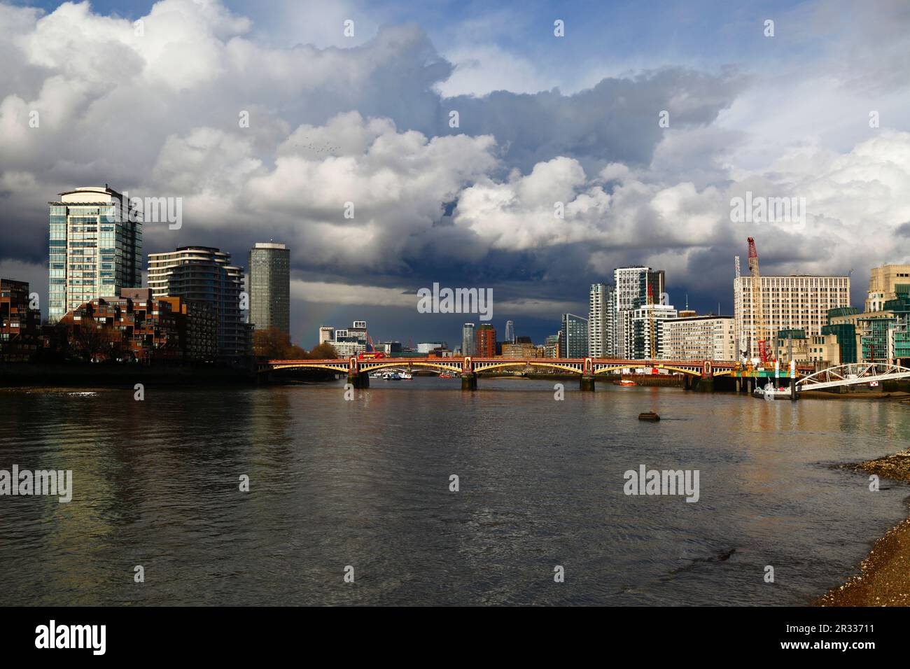 Panorama of the River Thames and New Vauxhall Bridge under a stormy sky, London, UK Stock Photo