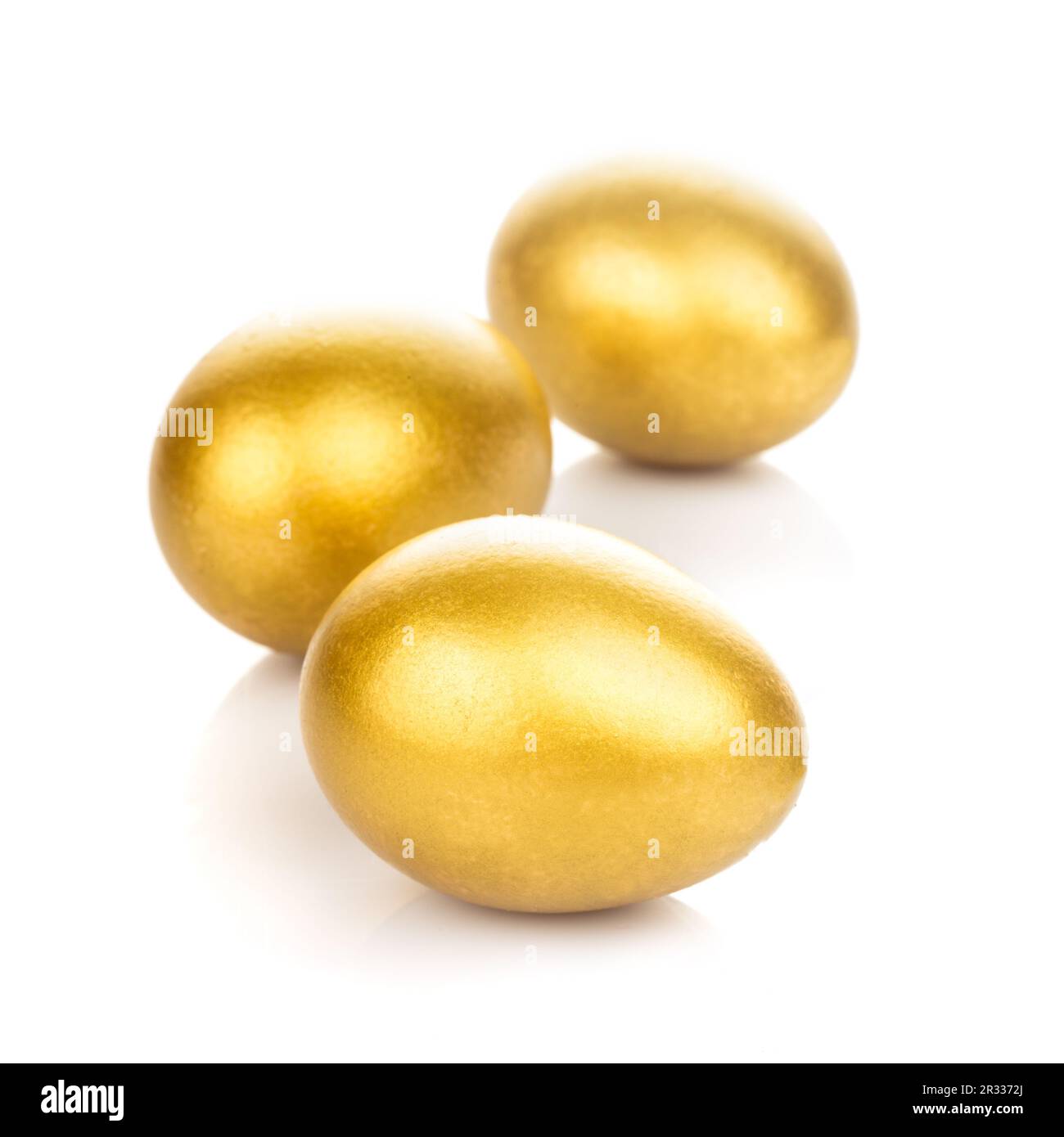 Golden eggs isolated Stock Photo Alamy