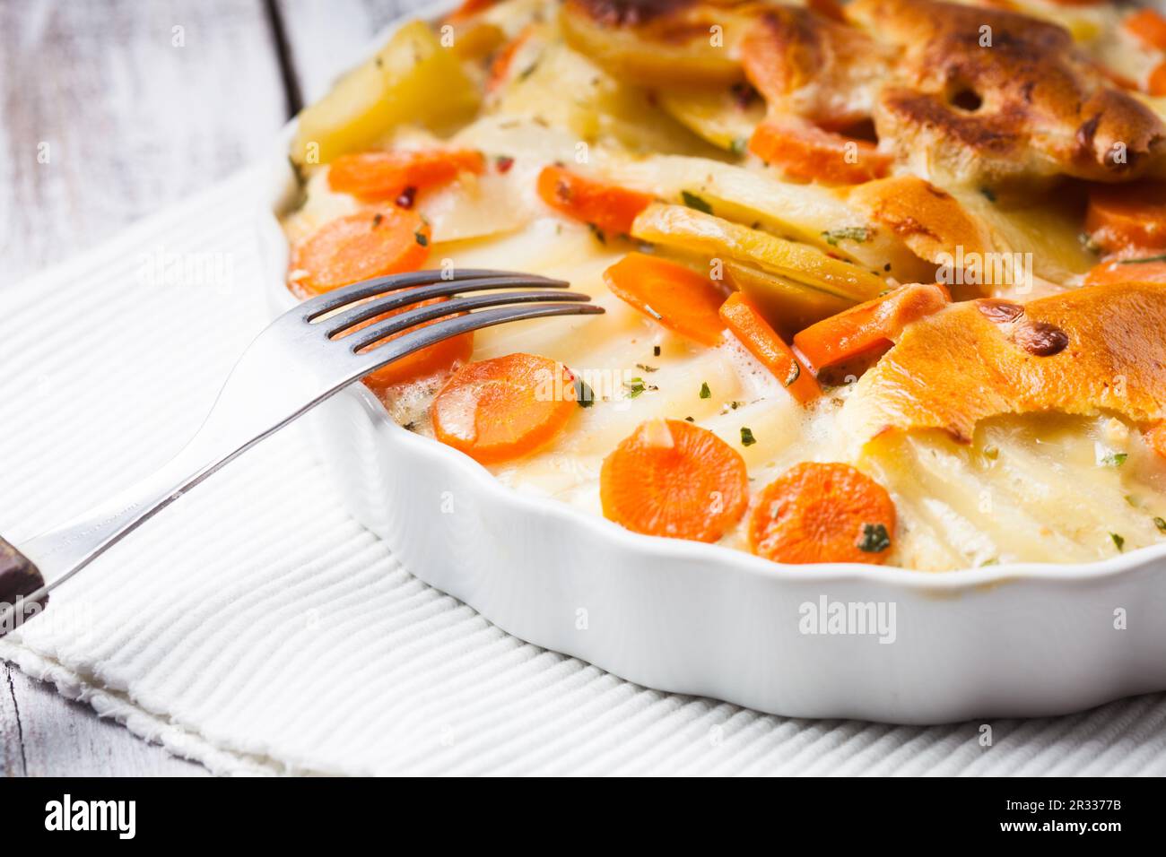 Potato and carrot gratin Stock Photo Alamy
