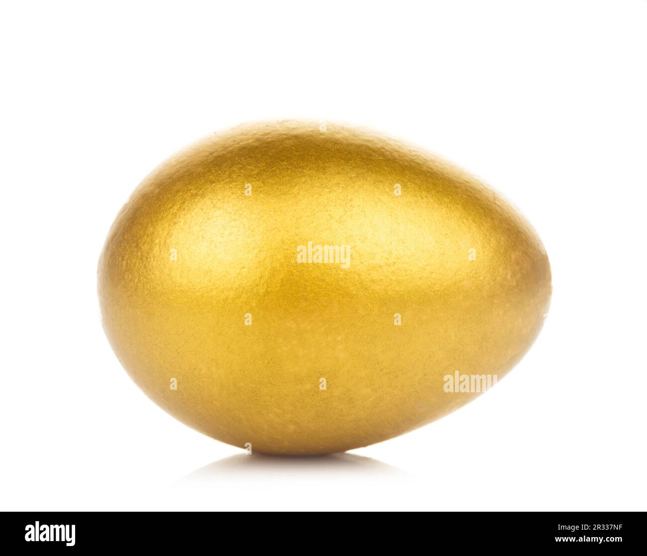 Golden egg isolated Stock Photo - Alamy