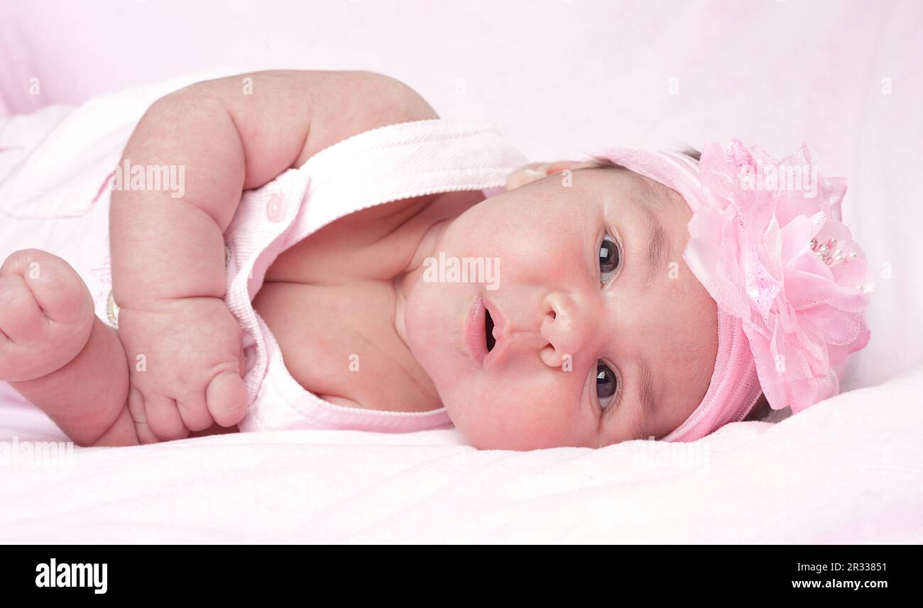 Baby girl in pink Stock Photo