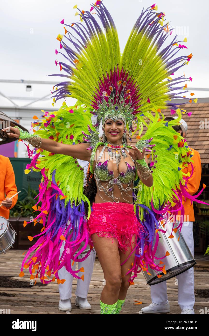 London, UK. 22 May 2023. A carnival performer celebrates the launch of