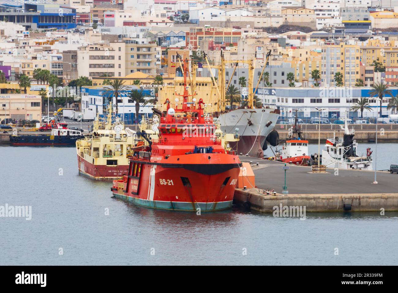 Orange, Deep sea rescue, salvage, fire and pollution control vessel, Miguel de Cervantes, moored in Las Palmas harbour. Las Palmas, Gran Canaria, Spai Stock Photo