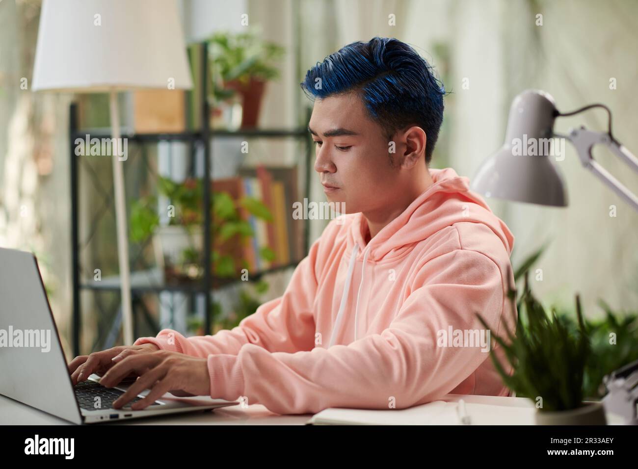 Serious young man home hi-res stock photography and images - Alamy