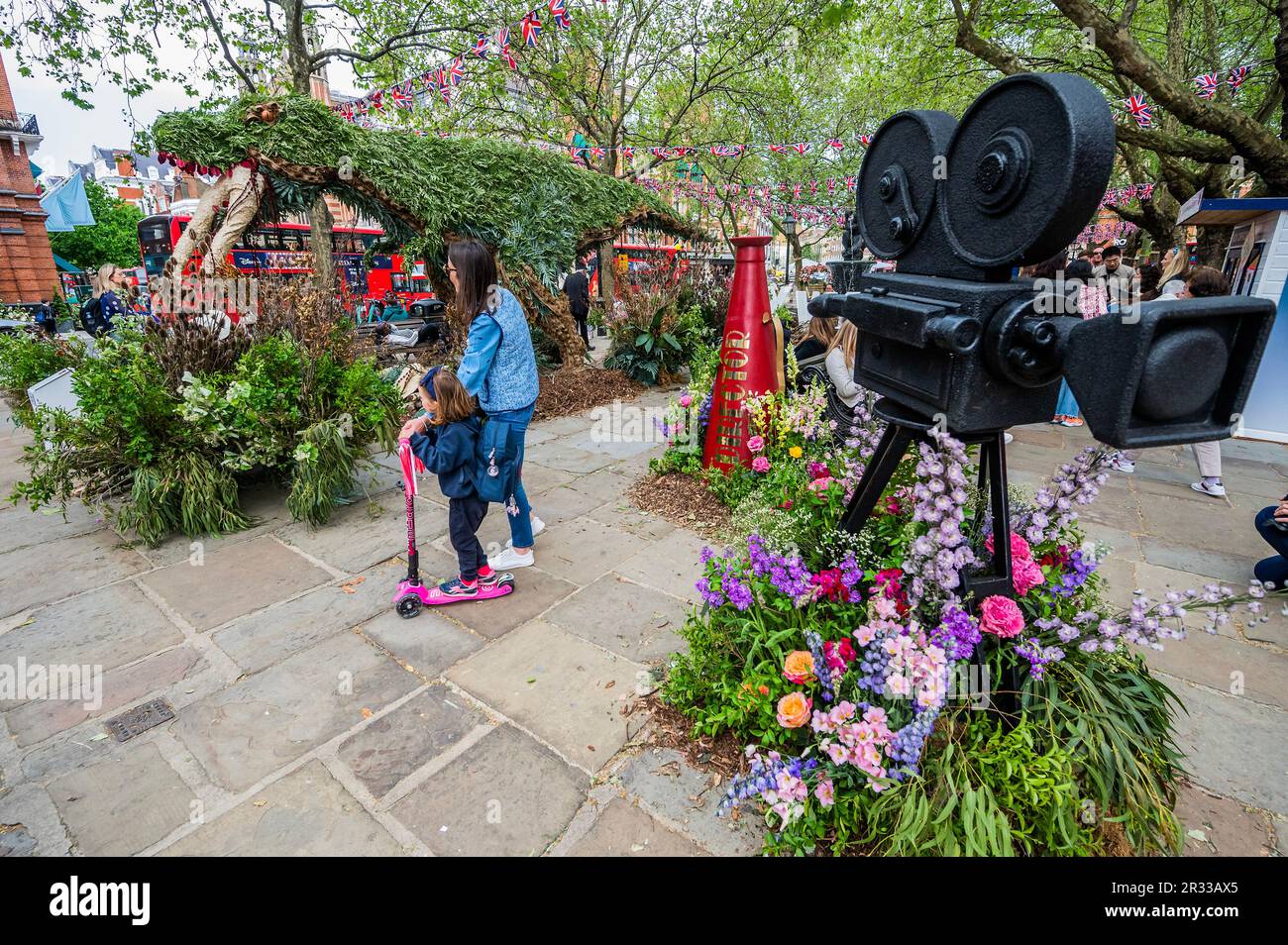 London, UK. 22nd May, 2023. A life size T-rex in Sloane Square - Chelsea in Bloom 2023 has a film theme in its annual fringe position to the RHS Chelsea Flower Show. Credit: Guy Bell/Alamy Live News Stock Photo