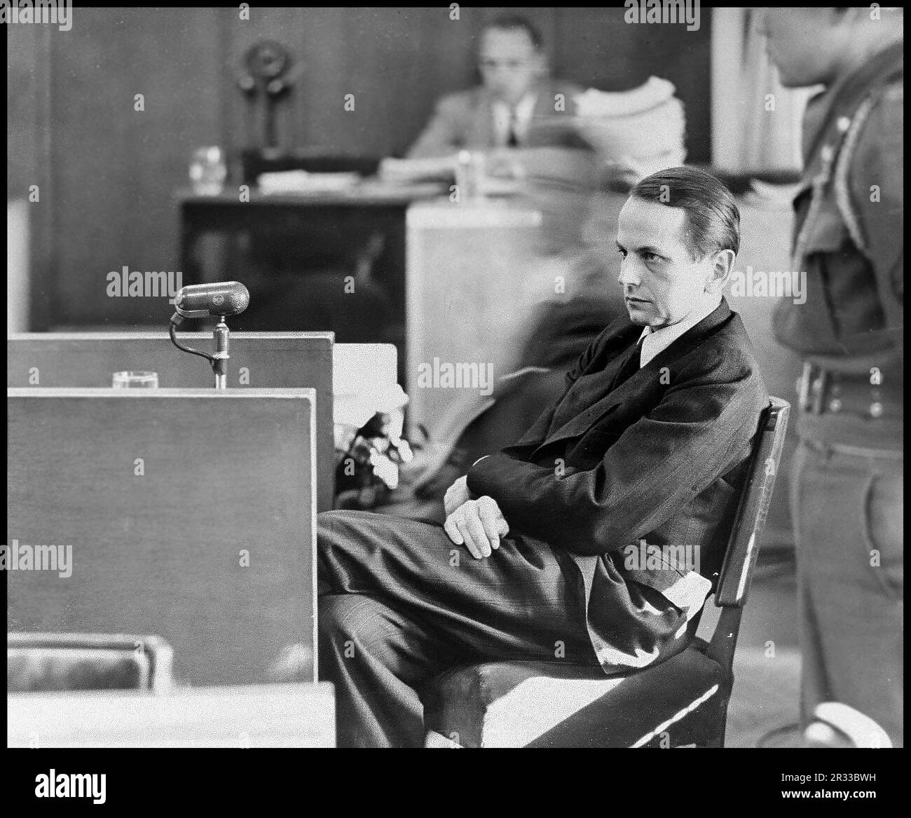 Defendant Otto Ohlendorf testifies on his own behalf at the Einsatzgruppen Trial. Nuremberg Trials 1950 Otto Ohlendorf was a German SS functionary and Holocaust perpetrator during the Nazi era. An economist by education, he was head of the Sicherheitsdienst Inland, responsible for intelligence and security within Germany.  Born: 4 February 1907, Hoheneggelsen, Söhlde, Germany Died: 7 June 1951, Landsberg Prison, Landsberg am Lech, Germany Nationality: German Party: Nazi Party Education: Leipzig University Conviction(s): Crimes against humanity; War crimes; Membership in a criminal organization Stock Photo