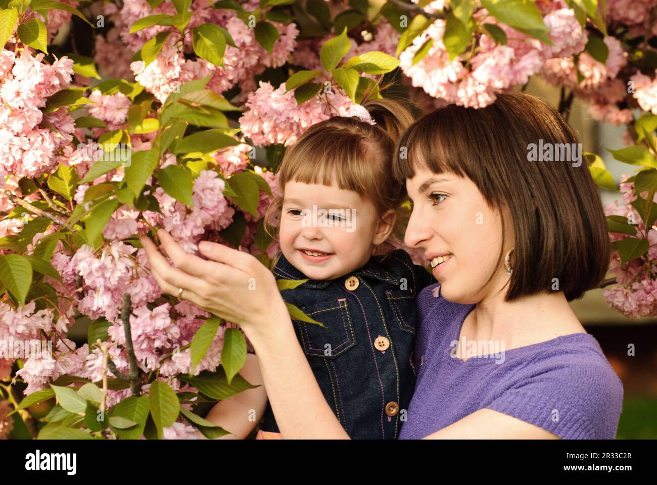 Mother and daughter in garden Stock Photo