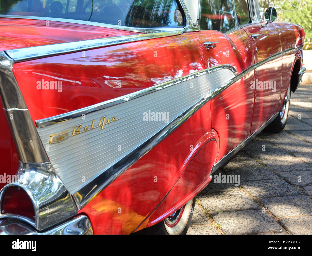 Vintage Belair chevrolet car on exhibition of vintage cars in Brazil, South America, side view of the bodywork, red color, highlight for the name BelA Stock Photo