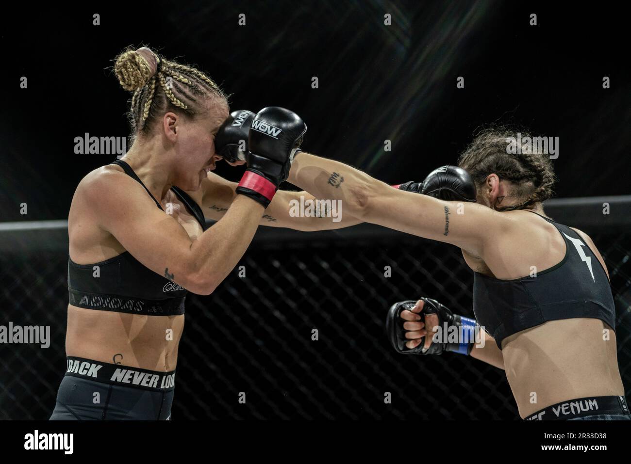 Madrid, Spain. 20th May, 2023. Chanel Forster and Mercedes Custodio fight during the Mixed Martial Arts competition 'WOW 9 : El Camino del Guerrero' at Palacio de Vistalegre Arena. (Photo by Guillermo Gutierrez/SOPA Image/Sipa USA) Credit: Sipa USA/Alamy Live News Stock Photo