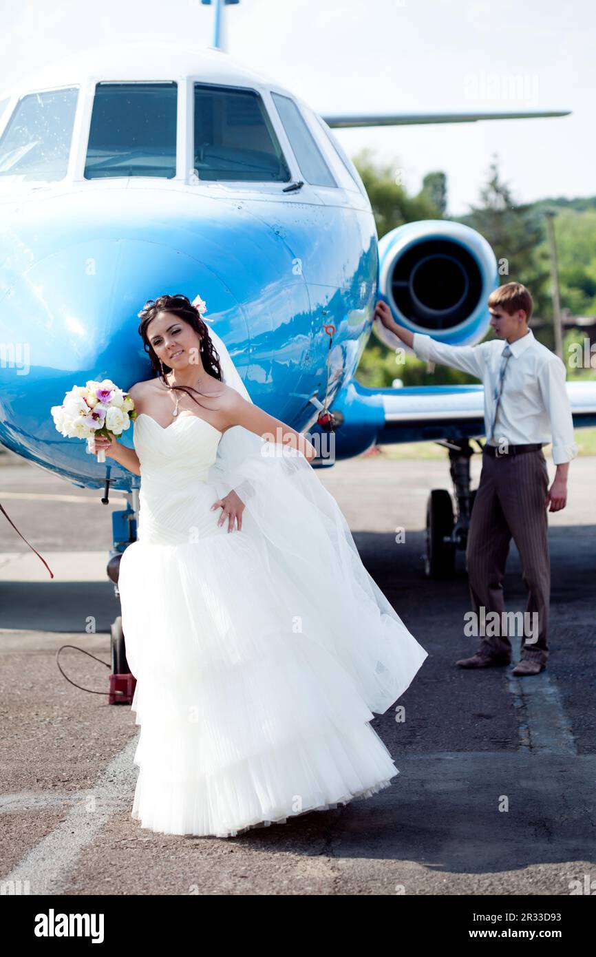 Wedding couple fly on honeymoon Stock Photo Alamy
