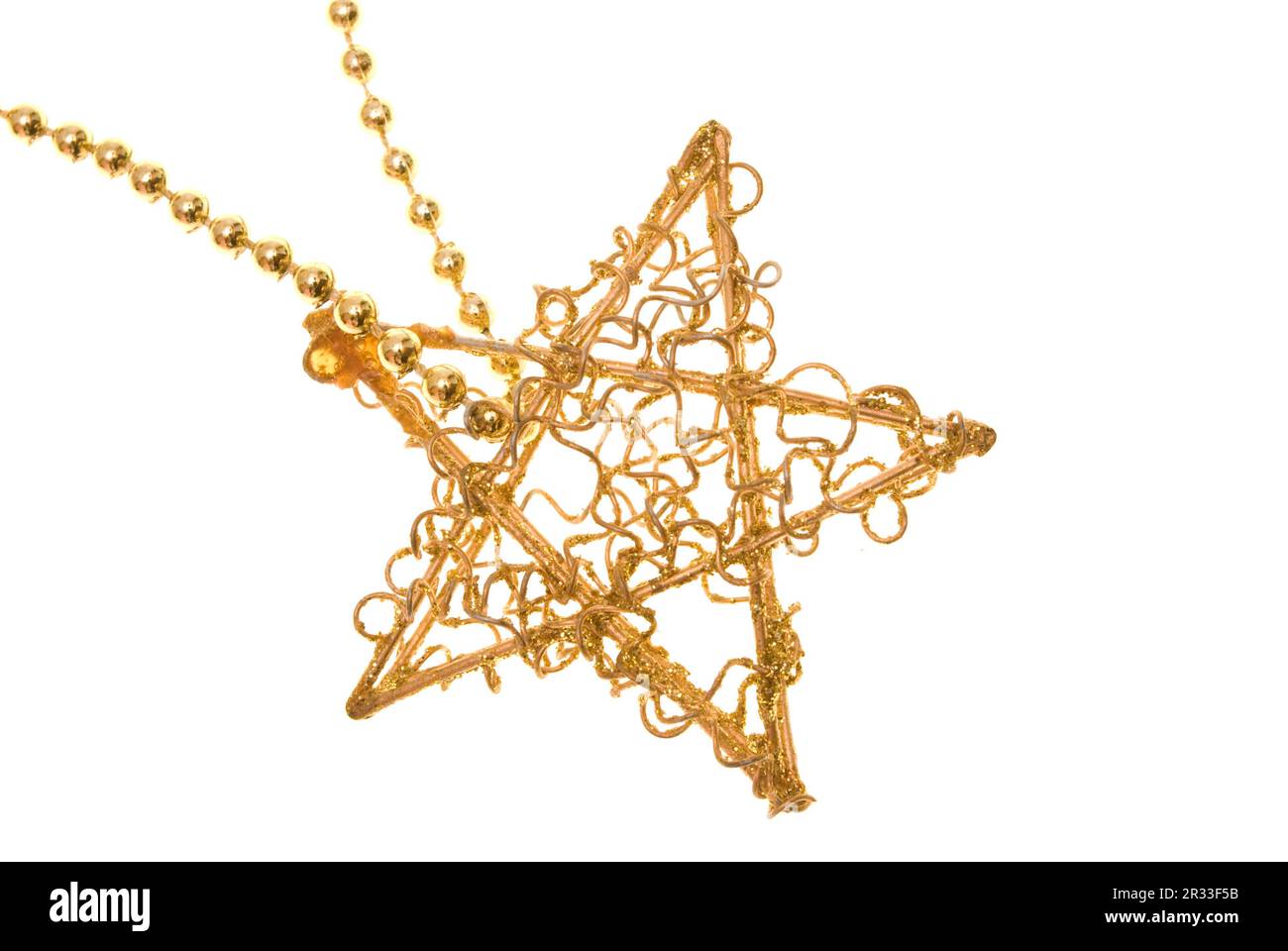 Christmas gold star on chain Stock Photo