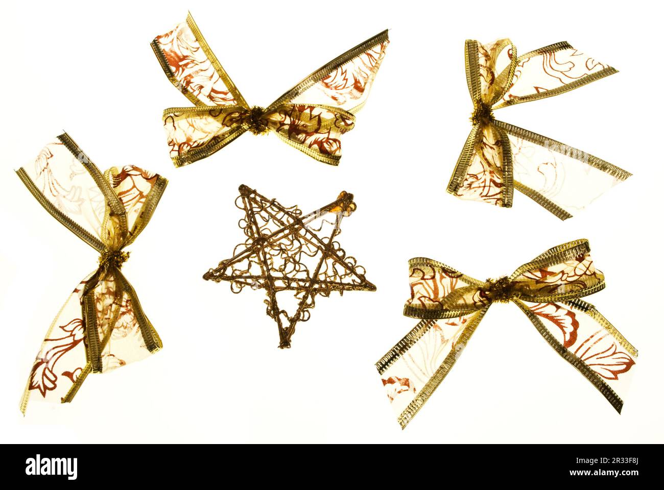 Christmas gold bows and star Stock Photo
