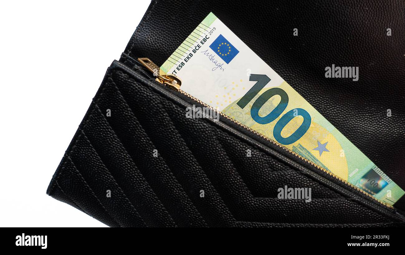 Euro cash money. Paper money in a black, leather wallet close up. Cash of paper currency background, isolated on white background. Stock Photo