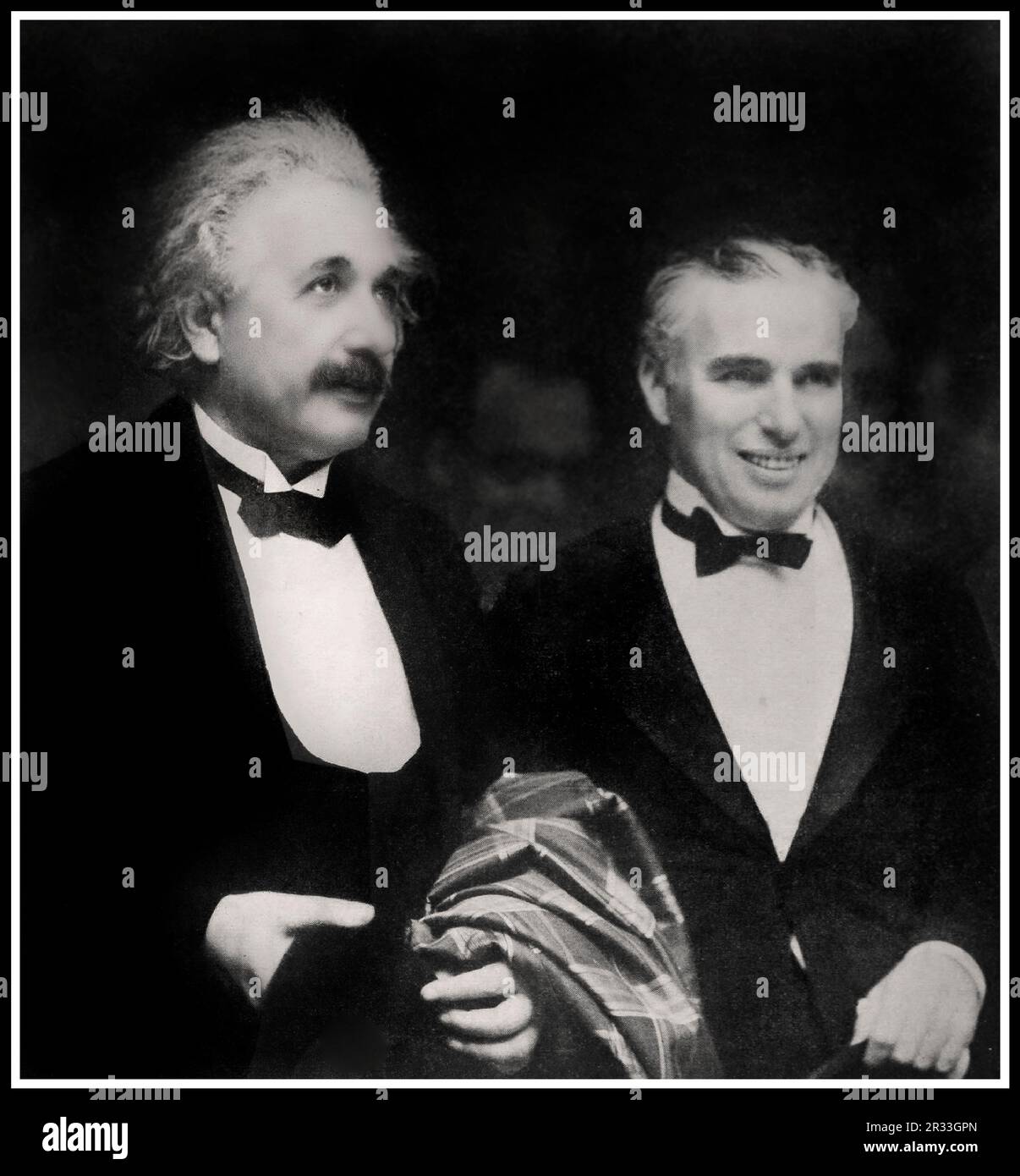 Albert Einstein with Charlie Chaplin at the 1931 premiere of City Lights.  City Lights is a 1931 American silent romantic comedy-drama film written, produced, directed by, and starring Charlie Chaplin. The story follows the misadventures of Chaplin's Tramp as he falls in love with a blind girl (Virginia Cherrill) and develops a turbulent friendship with an alcoholic millionaire (Harry Myers). Stock Photo