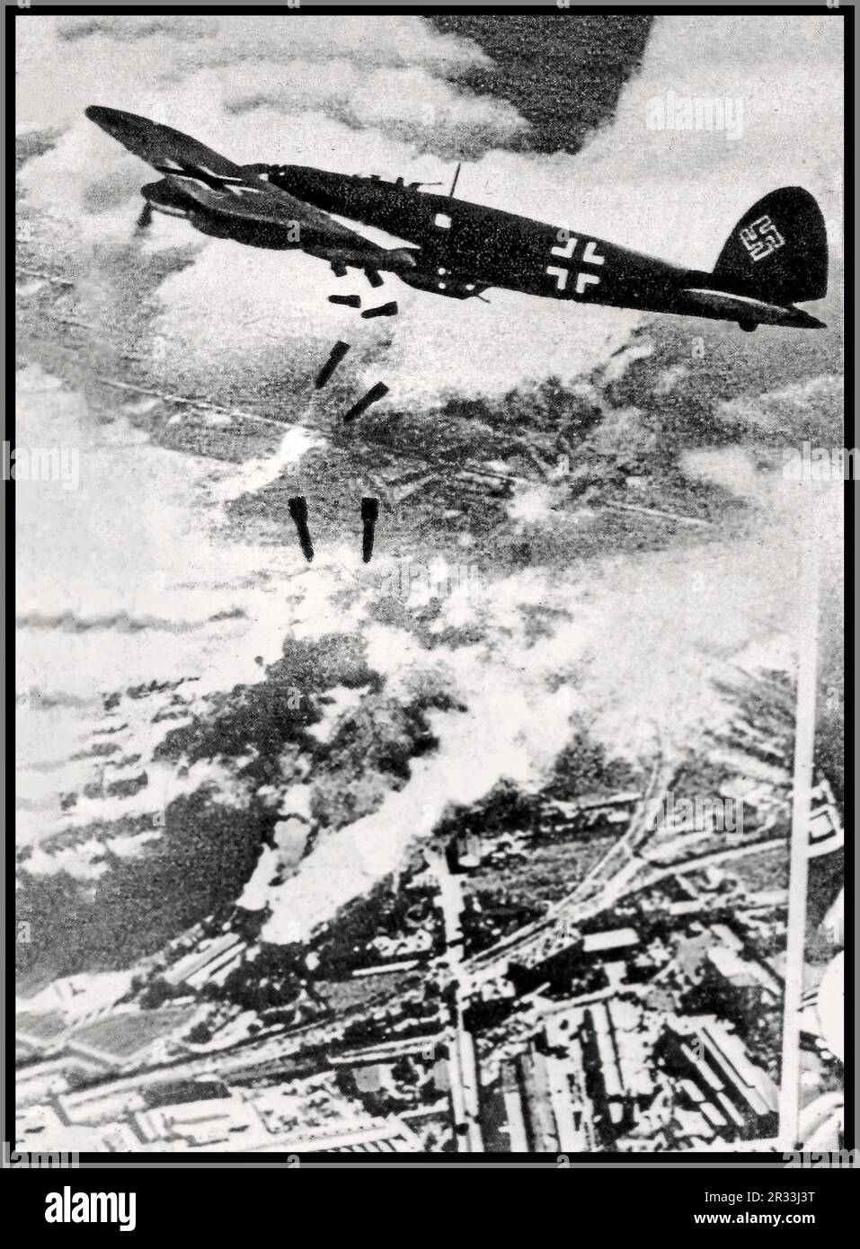 WARSAW BOMBING WW2 Nazi Germany Luftwaffe Heinkel He 111 airplane aircraft bombing Warsaw, Poland in 1939. Nazi Occupation World War II Second World War Stock Photo