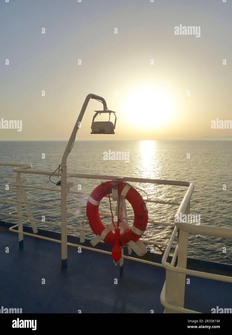 Lifebelt on the railing Stock Photo - Alamy