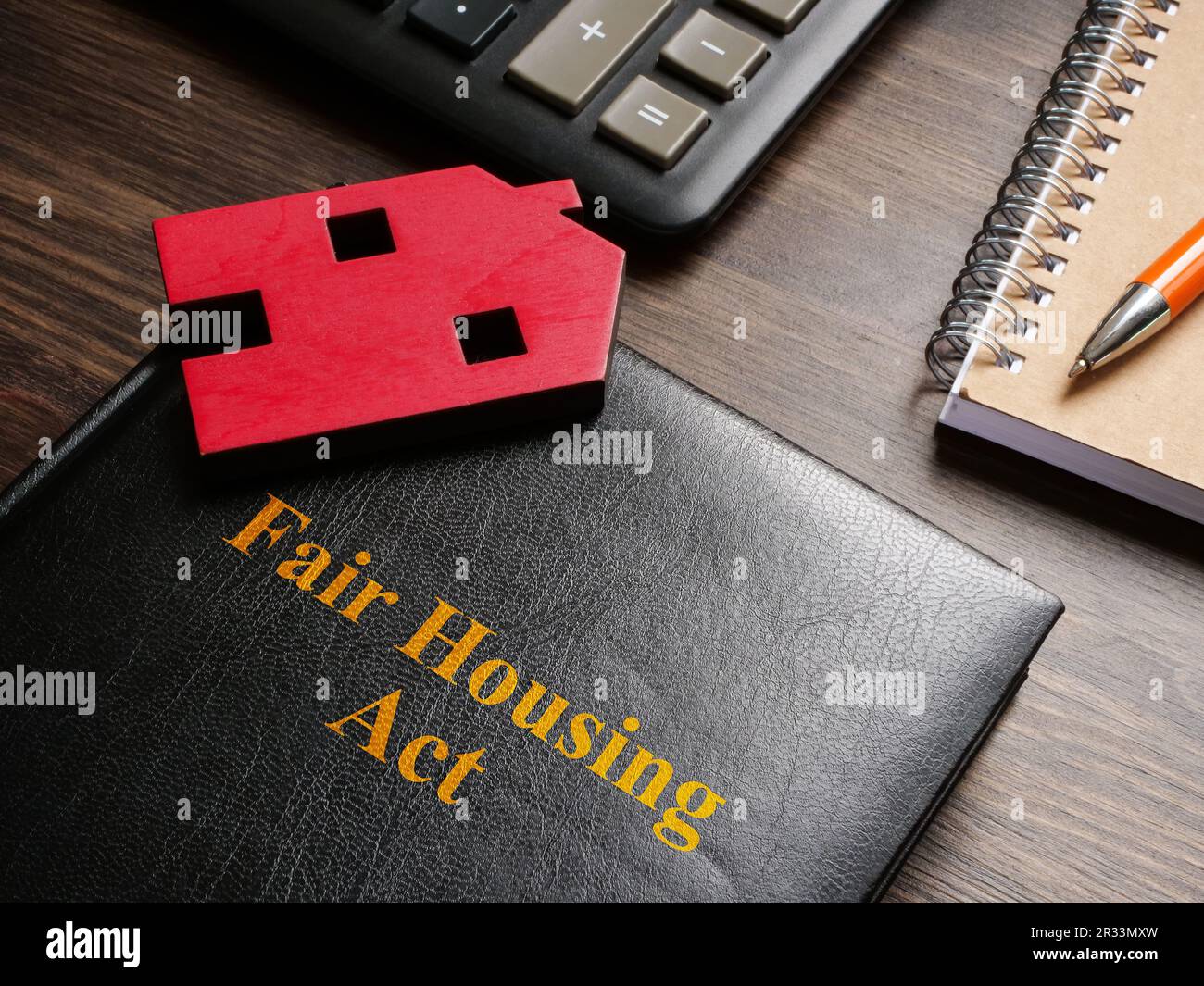 Model of home on the Fair housing act FHA book Stock Photo Alamy