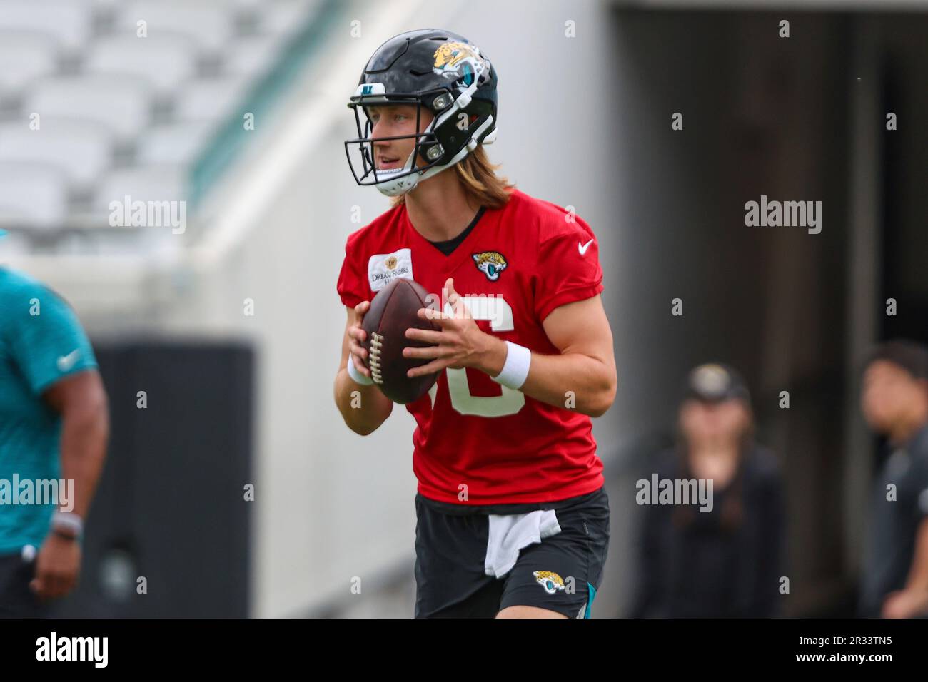 Jacksonville Jaguars quarterback Trevor Lawrence (16) practices during the NFL football team's
