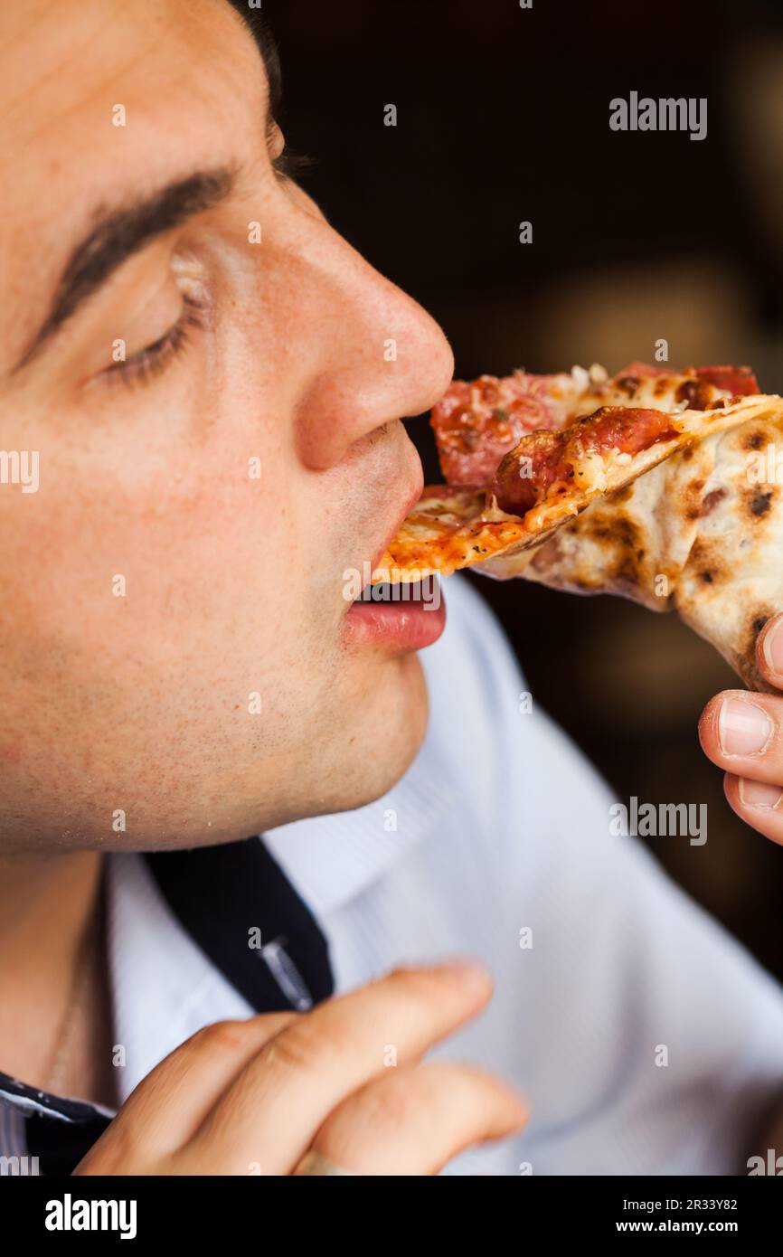 Eat pizza Stock Photo