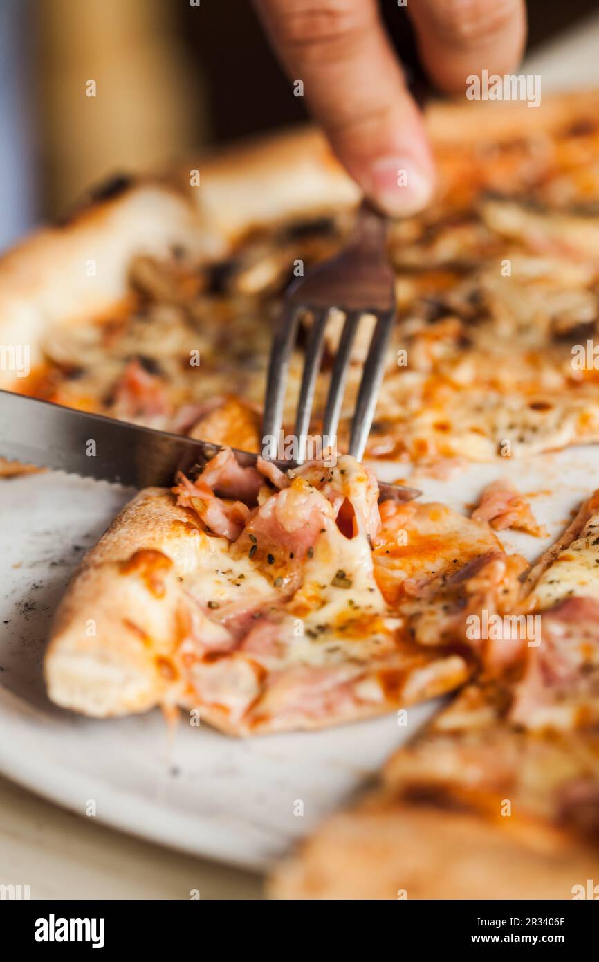 Eat pizza Stock Photo