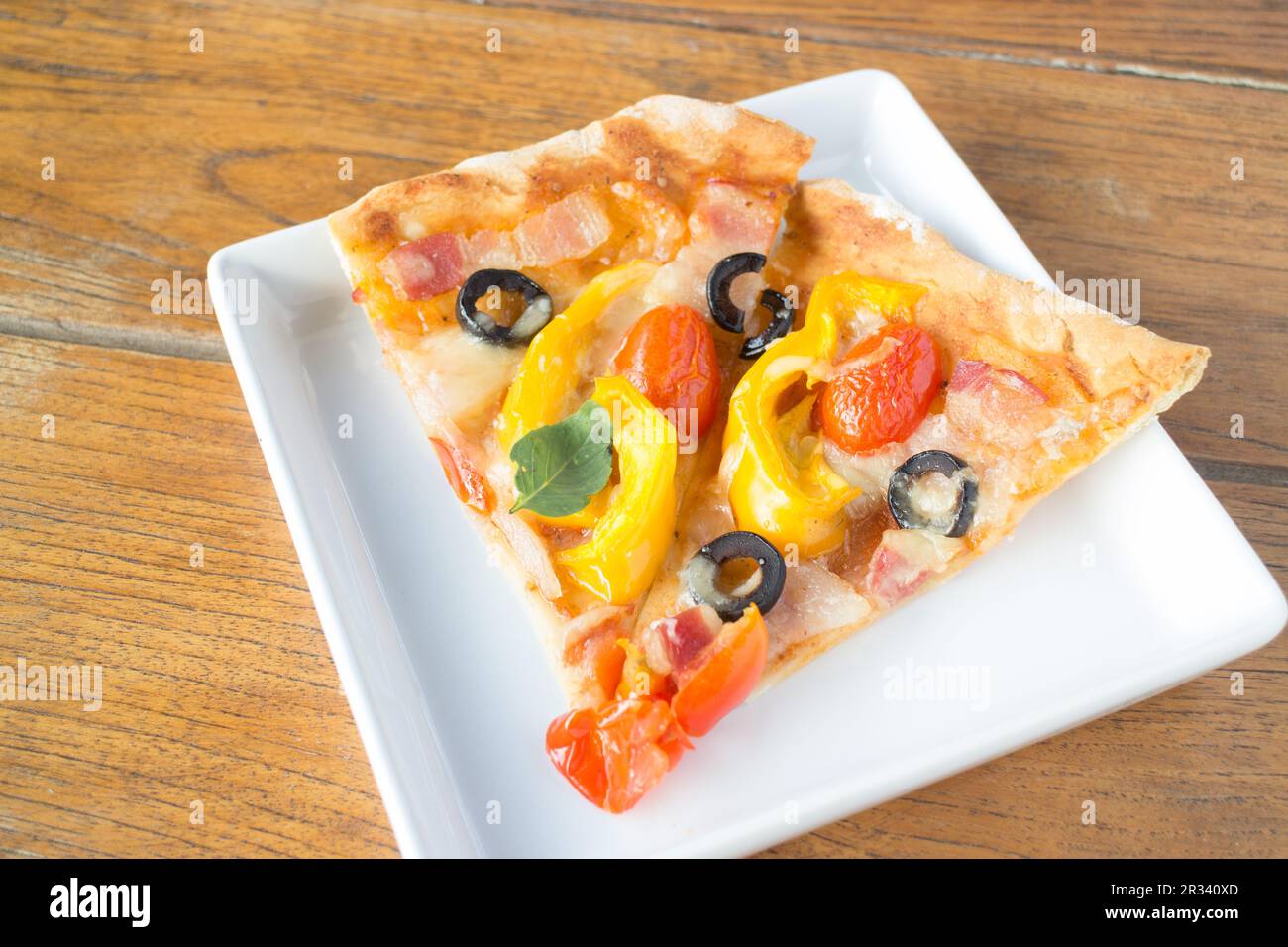 Homemade pizza with fresh vegetable topping Stock Photo