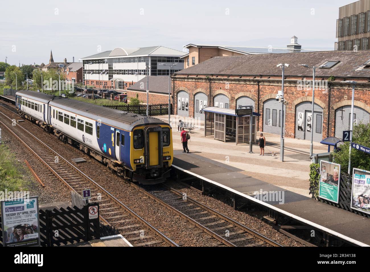 Man boarding Northern Rail train at Redcar Central railway station, England, UK Stock Photo