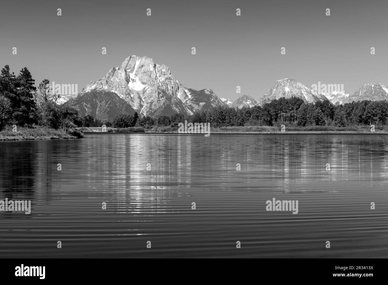 Grand Teton mountain peaks reflection by Snake River in Black and White, Grand Teton national park, Wyoming, USA. Stock Photo