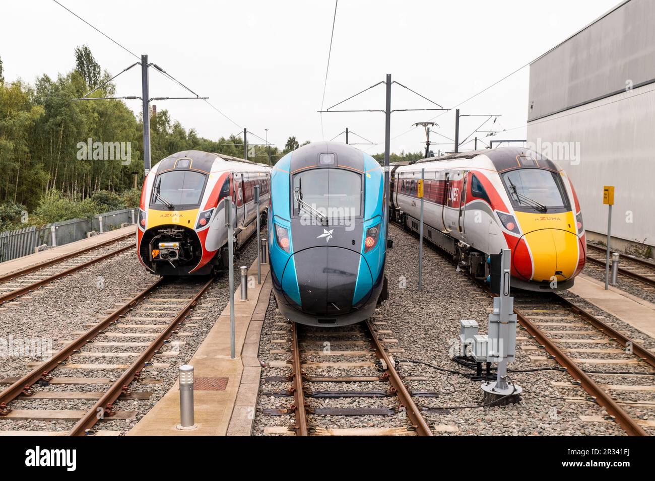 DONCASTER, UK - MAY 13, 2023. The front of a fleet of high speed inter city passenger trains in Trans Pennine Express and LNER livery on a maintenance Stock Photo