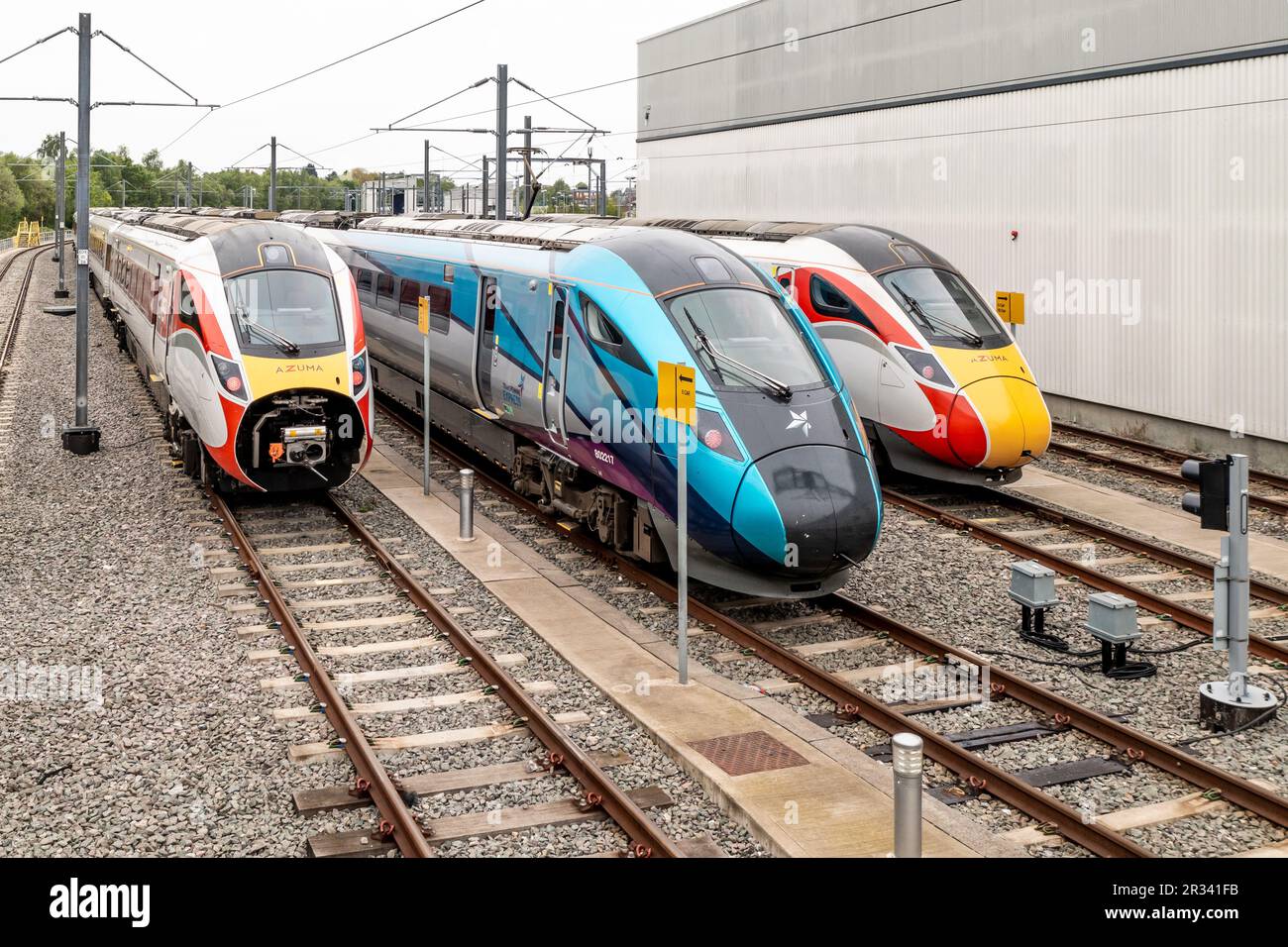 Aerial view of a fleet of Hitachi high speed passenger trains in Trans Pennine Express and LNER livery on the Hitachi Maintenance depot Stock Photo