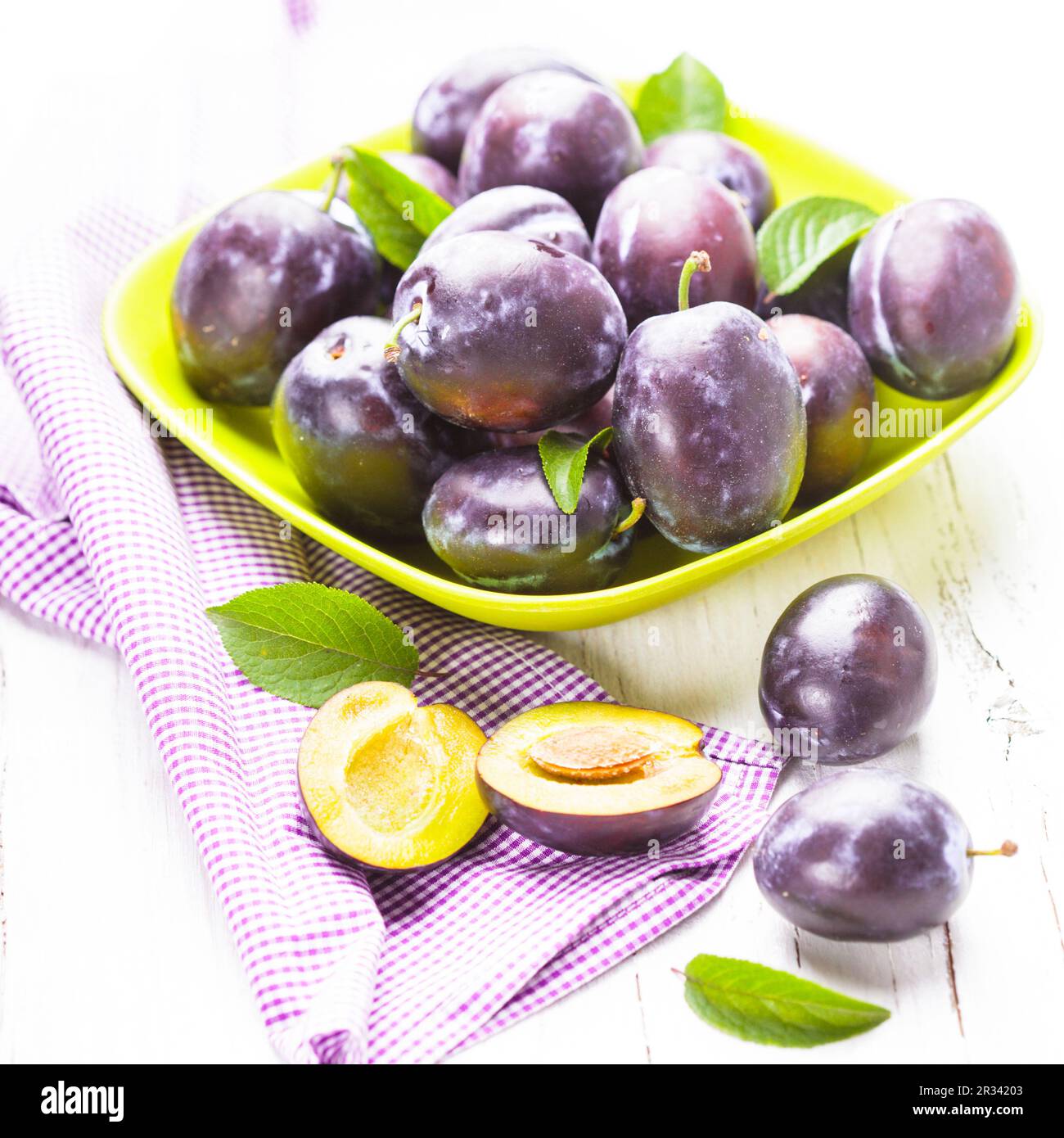 Fruit harvest plums in Cut Out Stock Images & Pictures - Alamy