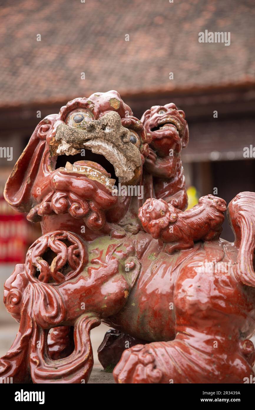 A Vietnamese statue of a lion at temple Stock Photo