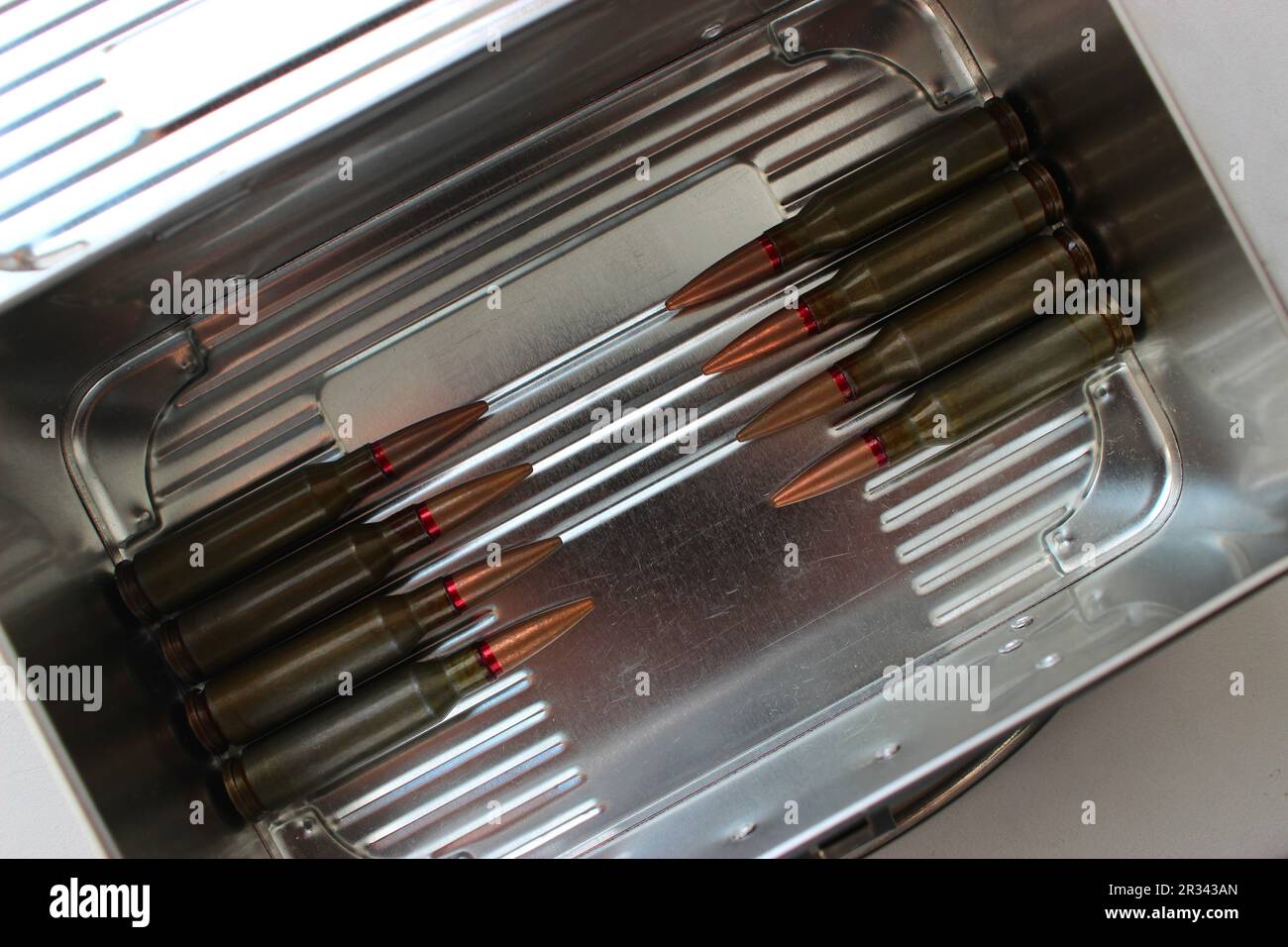 Live Ammunition In A Rows Bullets To Bullets Steel Surface Angle View