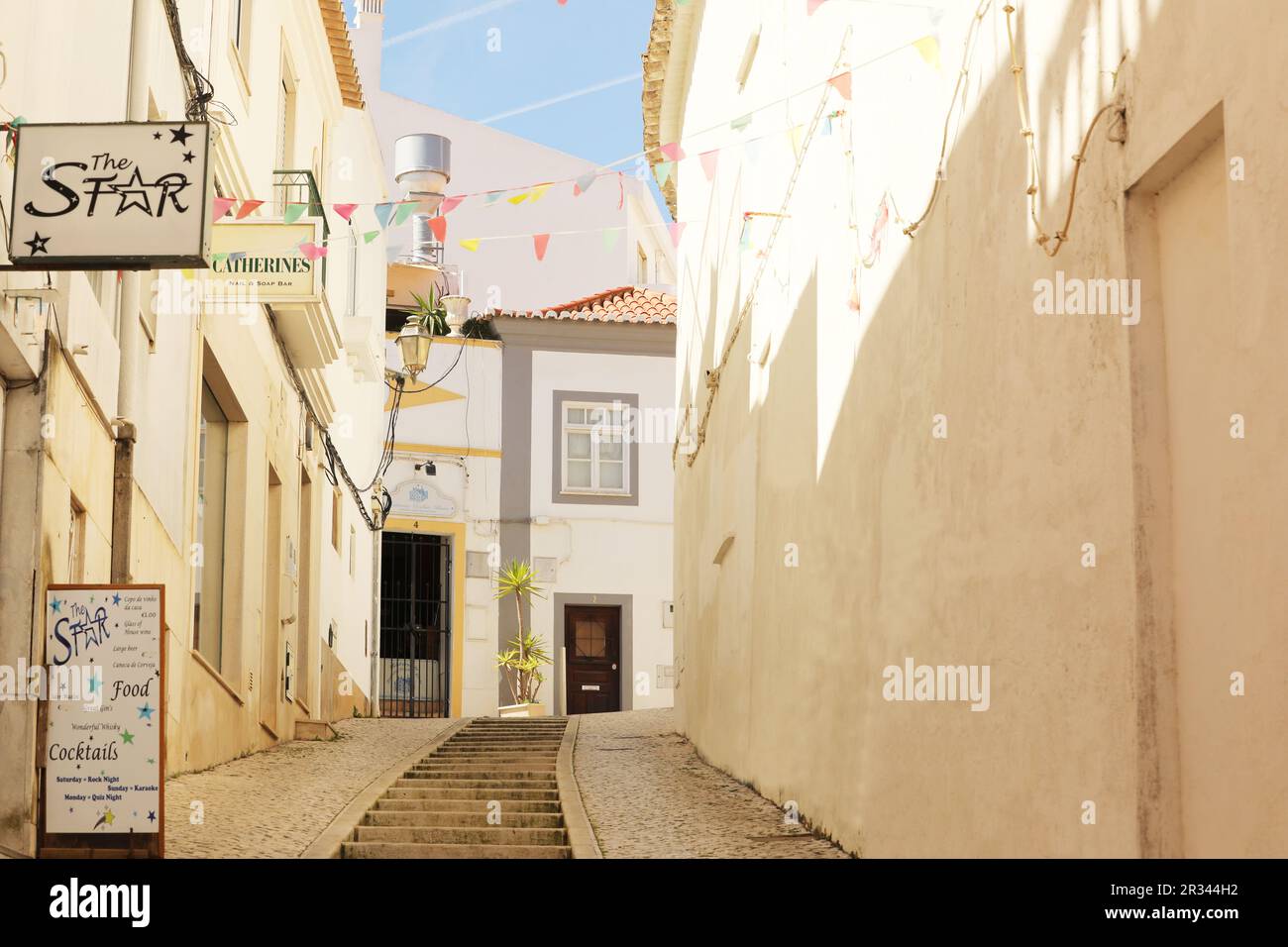 Buildings painted in pastel colours, Old Town, Lagos, Algarve, Portugal Stock Photo